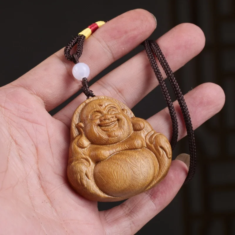 Exquisite green sandalwood carving of Maitreya with a large belly, wooden pendant for neck hanging, Buddha statue necklac
Exquisite green sandalwood carving of Maitreya with a large belly, wooden pendant for neck hanging, Buddha statue necklac