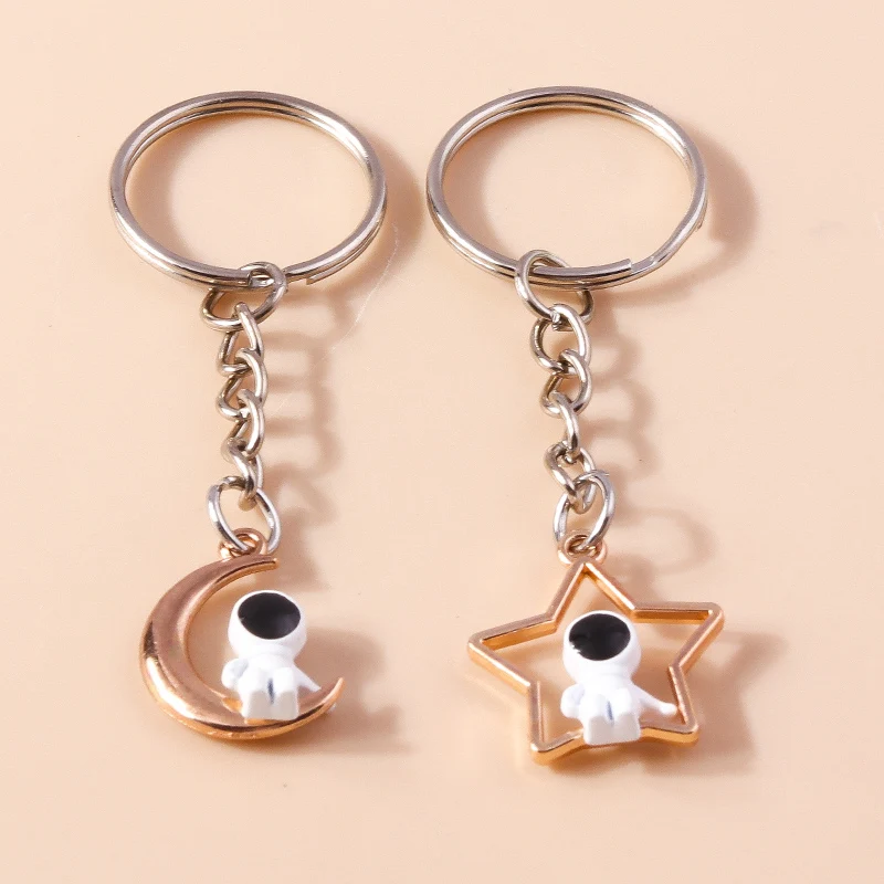 Cute Astronaut Keychain Metal Hollow Moon Star Keyrings for Women Men Car Key Handbag Pendant Key Chains DIY Accessories
Cute Astronaut Keychain Metal Hollow Moon Star Keyrings for Women Men Car Key Handbag Pendant Key Chains DIY Accessories