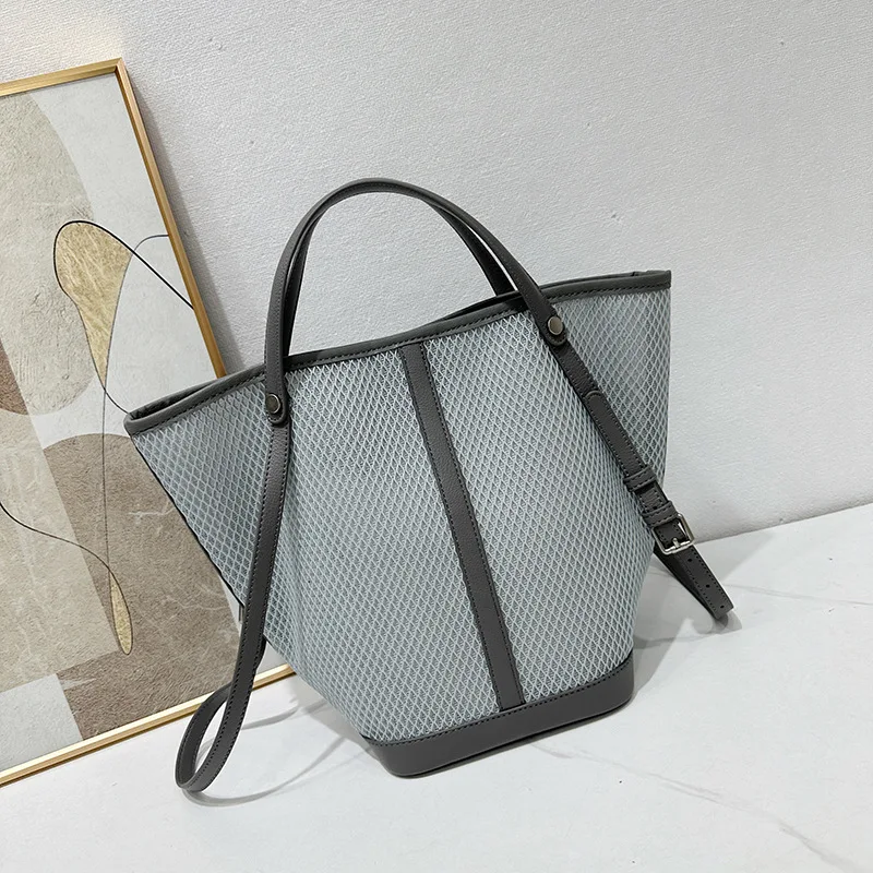 Women's Luxury Hollow out Mesh Beach Bucket Bag Designer Handbag with Inner Pocket Underarm Shoulder 2026 New Fashion
Women's Luxury Hollow out Mesh Beach Bucket Bag Designer Handbag with Inner Pocket Underarm Shoulder 2026 New Fashion