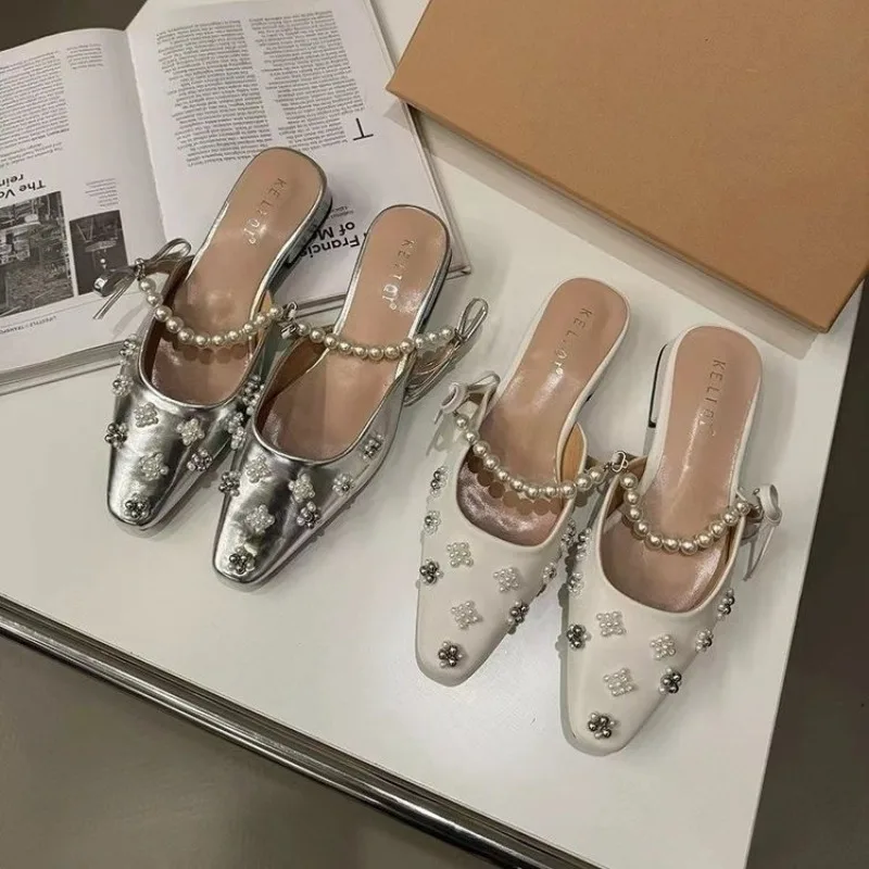 French Baotou Half Drag Women Outside Wear Summer New Pearl Bow High Heel Sandals
French Baotou Half Drag Women Outside Wear Summer New Pearl Bow High Heel Sandals