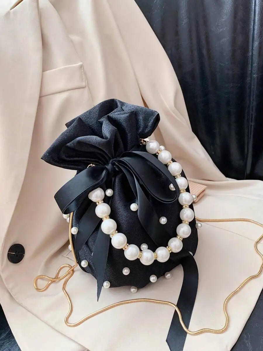 Elegant Pearl Decorated Drawstring Handbag With Ribbon Bow For Women
Elegant Pearl Decorated Drawstring Handbag With Ribbon Bow For Women