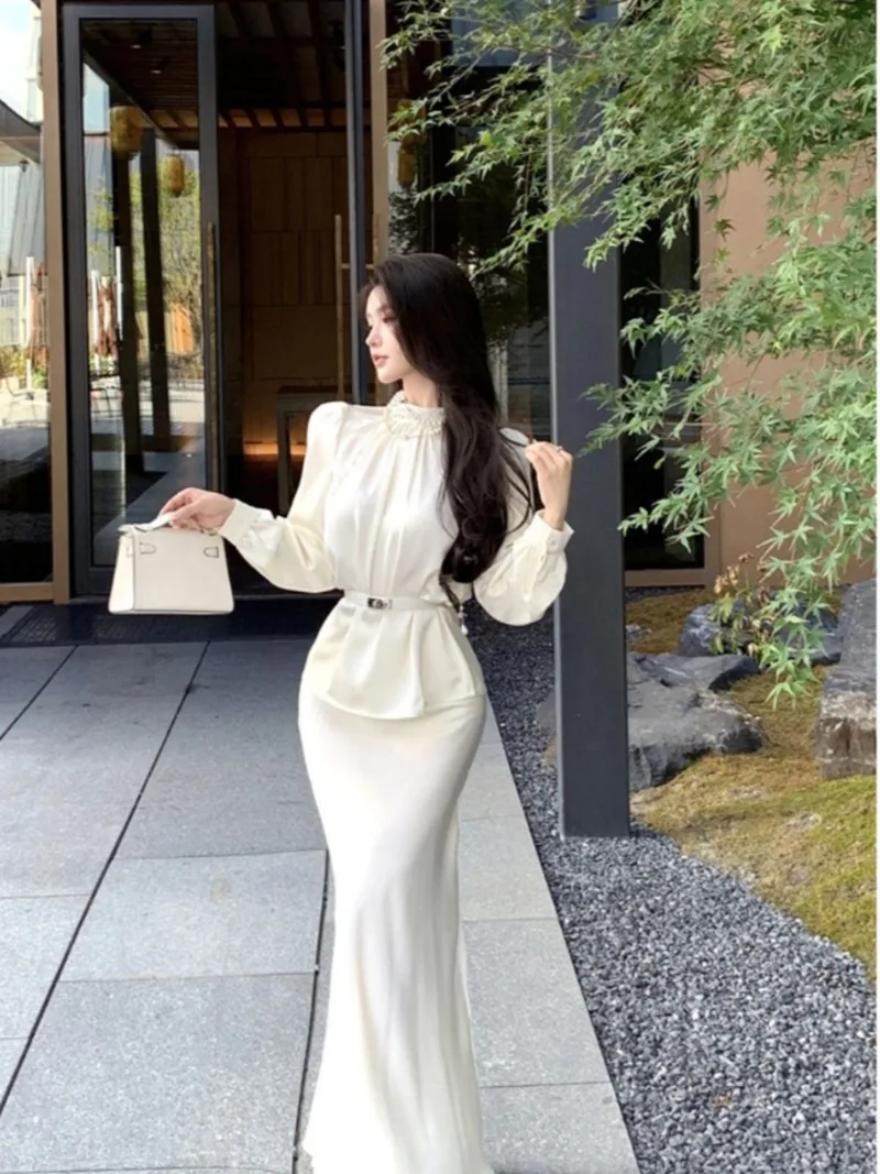 Новый французский элитный вечерний женский комплект из двух предметов, осенняя элегантная рубашка с воротником-стойкой и длинными рукавами + костюм с юбкой-русалкой 
Новый французский элитный вечерний женский комплект из двух предметов, осенняя элегантная рубашка с воротником-стойкой и длинными рукавами + костюм с юбкой-русалкой