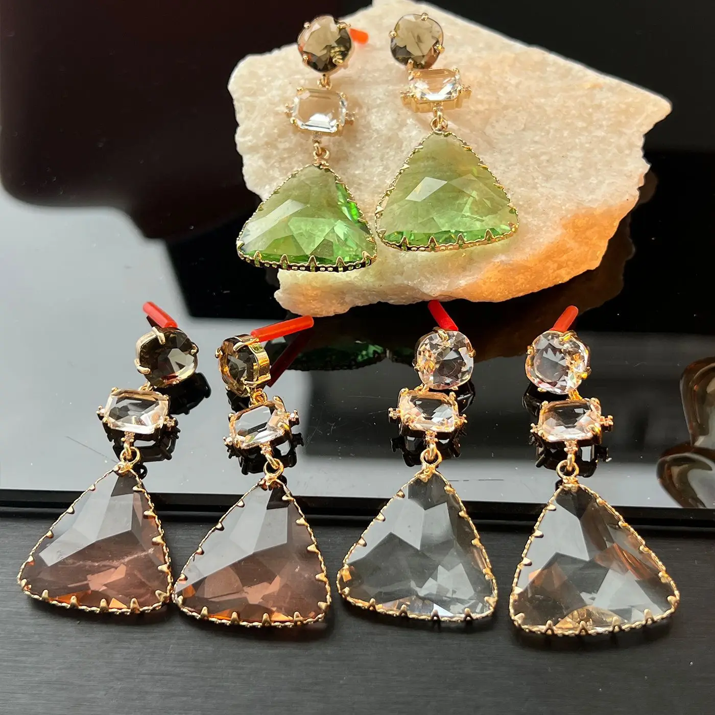Women New triangle glass design earrings 2026
Women New triangle glass design earrings 2026