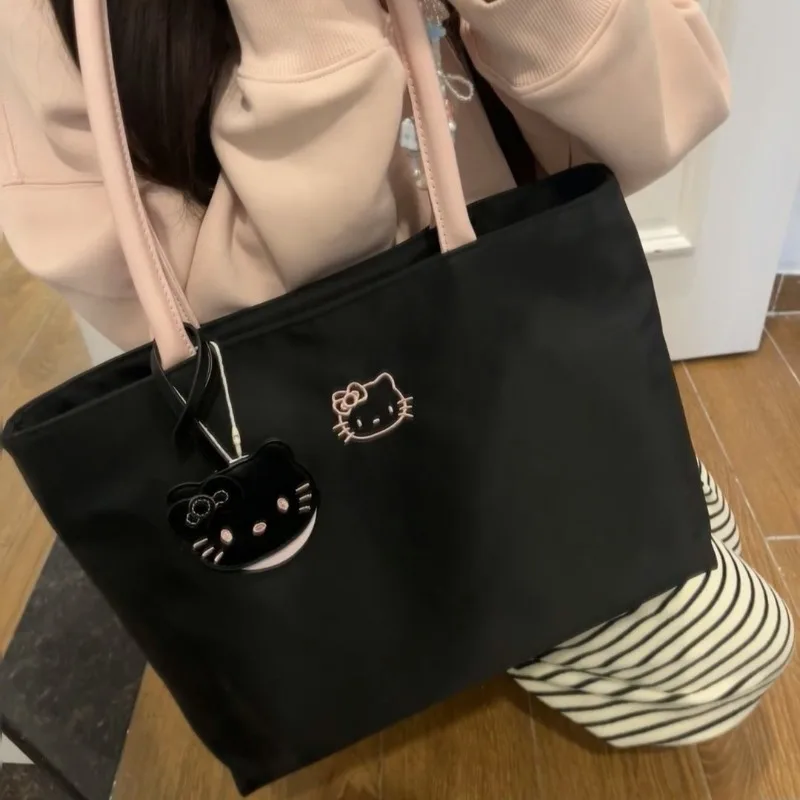 Hello Kitty High-capacity Commute Resistant To Dirt with Pendant Handbag Fashion Versatile Simple Embroidery Armpit Shoulder Bag
Hello Kitty High-capacity Commute Resistant To Dirt with Pendant Handbag Fashion Versatile Simple Embroidery Armpit Shoulder Bag