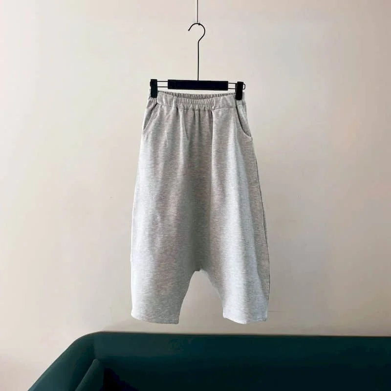 Baggy Pants for Women 2026 Summer Elastic Waist Loose Casual Capri Dropped-crotch Pants Korean Style Streetwear Women Clothing
Baggy Pants for Women 2026 Summer Elastic Waist Loose Casual Capri Dropped-crotch Pants Korean Style Streetwear Women Clothing