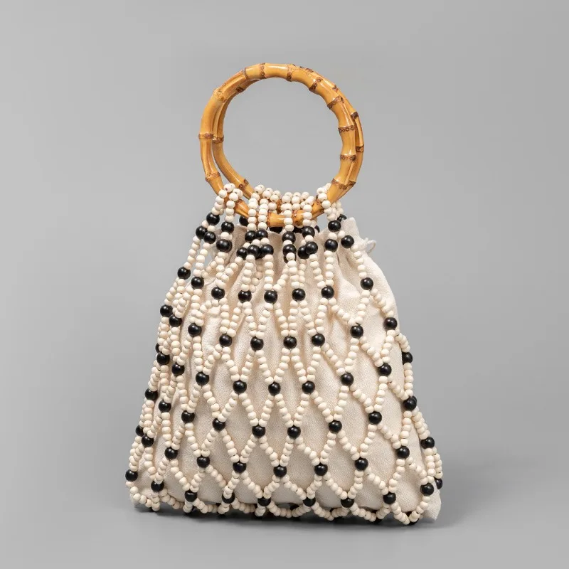 Boho Chic Hollow Woven Purse Women's Beach Travel Vacation Handbag Bamboo Handle Wooden Bead Black White Color Block Tote Bag
Boho Chic Hollow Woven Purse Women's Beach Travel Vacation Handbag Bamboo Handle Wooden Bead Black White Color Block Tote Bag