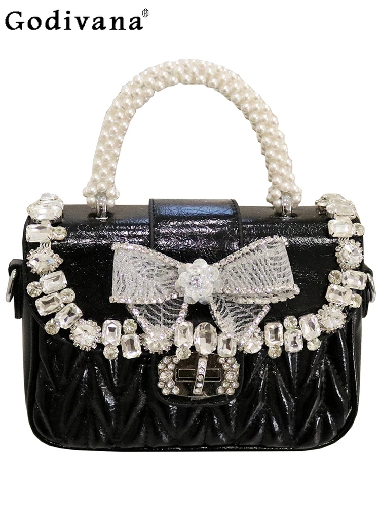 2025 Summer New Sweet Girl Bow Pearl Handbag Pleated Heavy Industry Diamond Set Premium Bag Shoulder Messenger Bag
2025 Summer New Sweet Girl Bow Pearl Handbag Pleated Heavy Industry Diamond Set Premium Bag Shoulder Messenger Bag