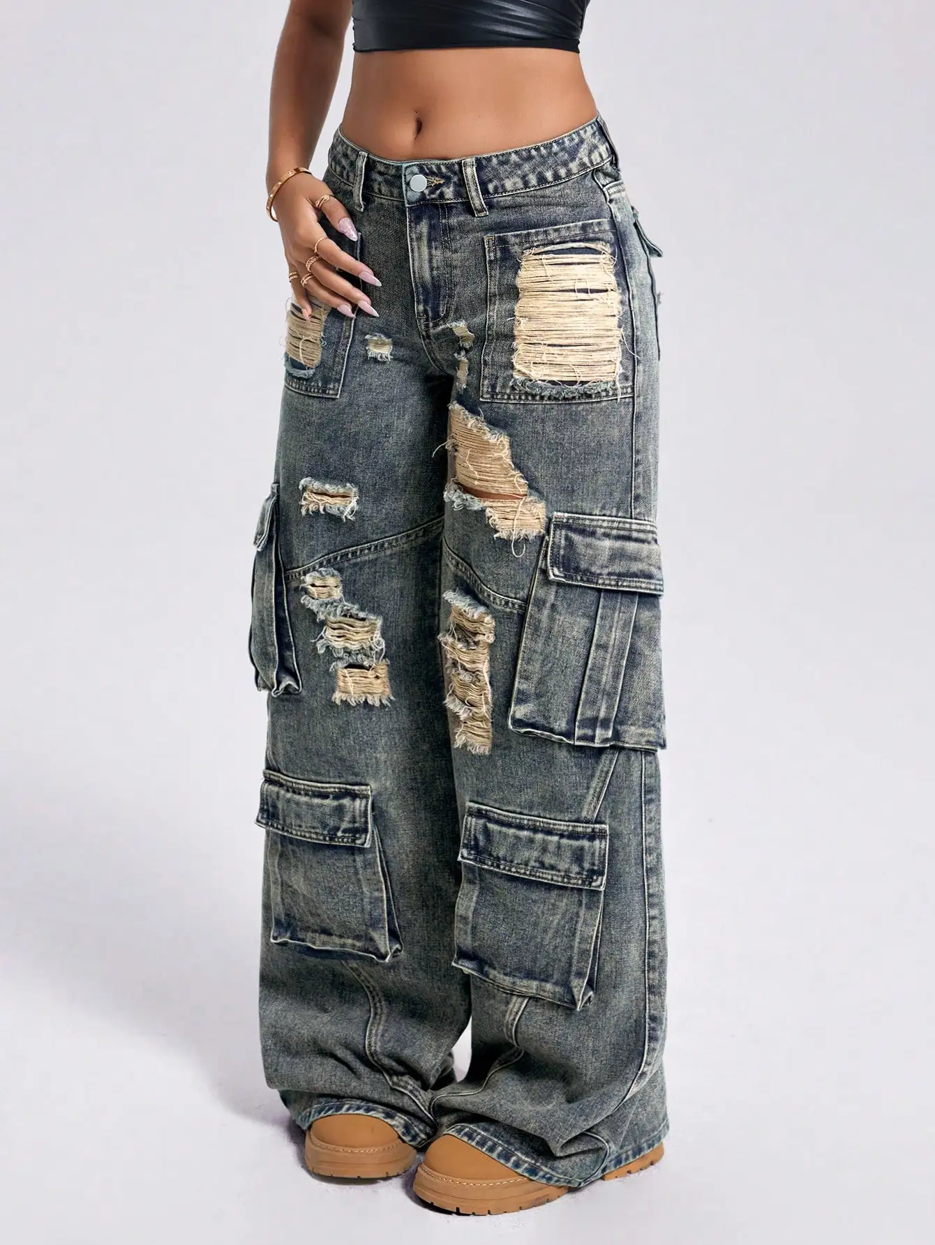 Женские джинсы-клеш с эффектом потертости, множеством карманов, низкой посадкой, в стиле гранж, из выстиранного денима
Женские джинсы-клеш с эффектом потертости, множеством карманов, низкой посадкой, в стиле гранж, из выстиранного денима