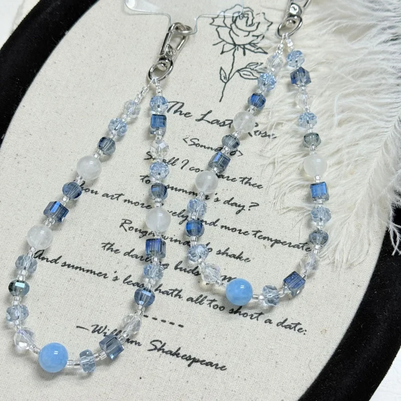Natural aquamarine blue moonlight handmade beaded crystal phone charm, fashionable and versatile for keychain, bag decoration
Natural aquamarine blue moonlight handmade beaded crystal phone charm, fashionable and versatile for keychain, bag decoration