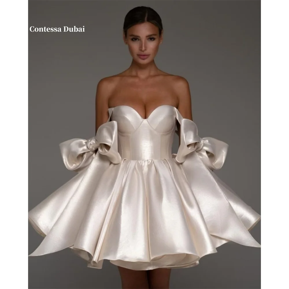 Contessa Dubai Bow Straps Ball Gown Prom Dresses Off the Shoulder Satin Mini فساتين سهرات Waist Cinching A-Line robes de soirée
Contessa Dubai Bow Straps Ball Gown Prom Dresses Off the Shoulder Satin Mini فساتين سهرات Waist Cinching A-Line robes de soirée