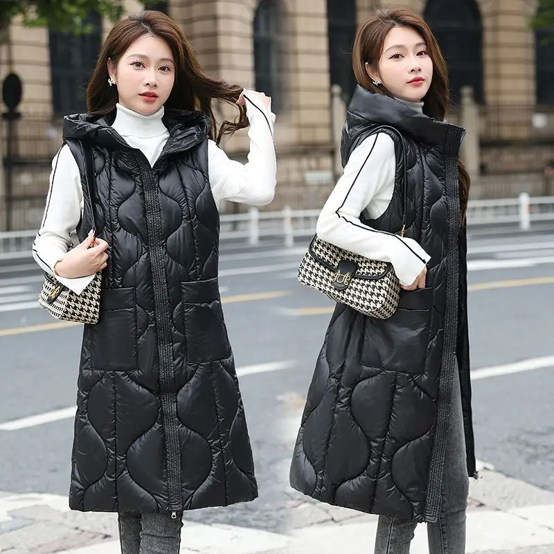 Hooded Vest Women M-2XL Sleeveless Cotton Coat 2024 Autumn Winter New Fashion Irregular Long Slim Light Thin Waistcoat J52
Hooded Vest Women M-2XL Sleeveless Cotton Coat 2024 Autumn Winter New Fashion Irregular Long Slim Light Thin Waistcoat J52