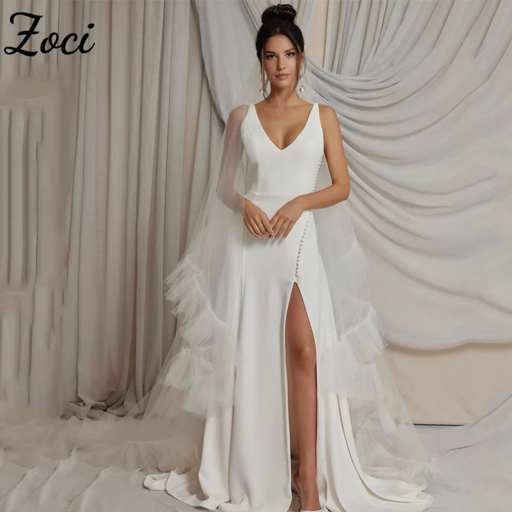 Zoci Pastrol V Neck A Line Wedding Dresses Customized High Split Satin Bride Dress Buttons Backless Sweep Train Bridal Dress
Zoci Pastrol V Neck A Line Wedding Dresses Customized High Split Satin Bride Dress Buttons Backless Sweep Train Bridal Dress