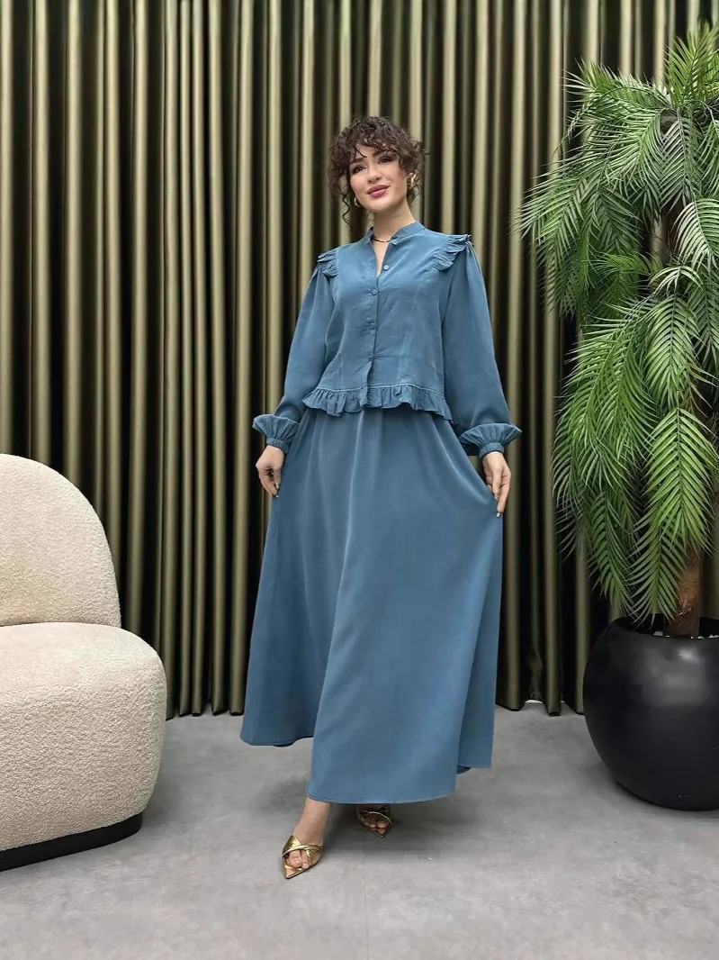 Модный повседневный длинный свек с воротником-стойкой и юбкой, женский комплект из двух предметов из полиэстера, осенний сезон, застежка на пуговицы
Модный повседневный длинный свек с воротником-стойкой и юбкой, женский комплект из двух предметов из полиэстера, осенний сезон, застежка на пуговицы