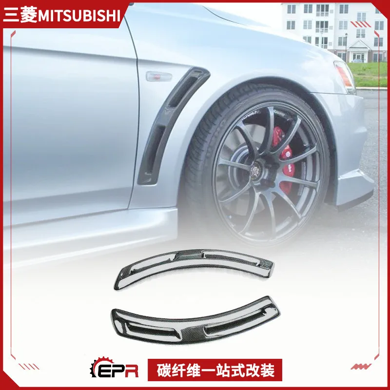 Suitable for Mitsubishi EVO10 Yishen X modification, carbon fiber fender air port Varis front sand board side trend
Suitable for Mitsubishi EVO10 Yishen X modification, carbon fiber fender air port Varis front sand board side trend