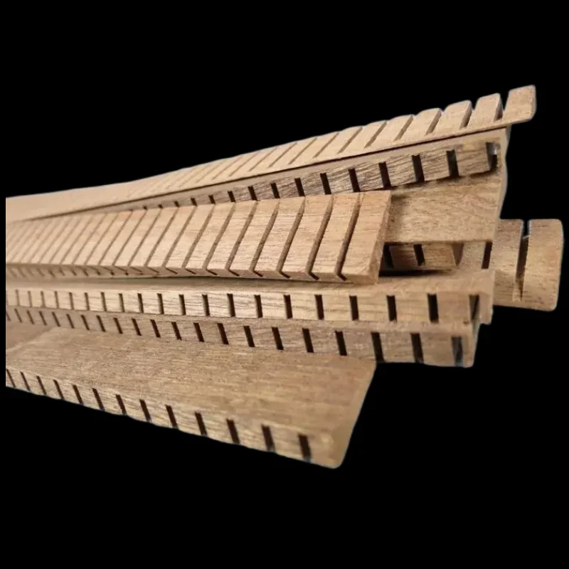 20Strips exquisite guitar Inside strip oblique triangle Sapeli stay tape,size18 x 5/1 thick x740mm long
20Strips exquisite guitar Inside strip oblique triangle Sapeli stay tape,size18 x 5/1 thick x740mm long