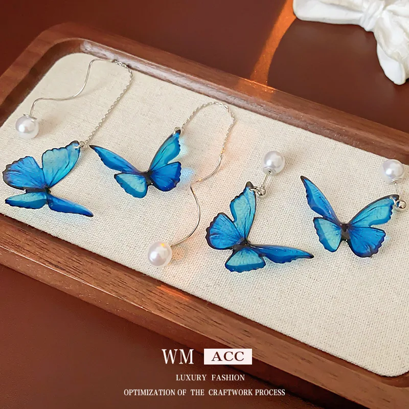 New Chinese style silver needle butterfly pearl ladies earrings earrings versatile high-end earrings
New Chinese style silver needle butterfly pearl ladies earrings earrings versatile high-end earrings