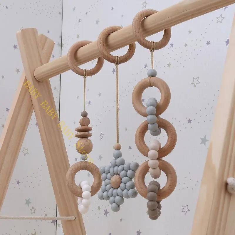 Q81A Baby Gym Frame Pendants Wooden Ring Silicone Beads Teether Stroller Rattle Infants Newborn Teething Nursing Molar
Q81A Baby Gym Frame Pendants Wooden Ring Silicone Beads Teether Stroller Rattle Infants Newborn Teething Nursing Molar