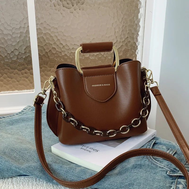 New Solid Color Bucket Bag Women's Simple Portable Messenger Bag Foreign Style Commuting Versatile 
New Solid Color Bucket Bag Women's Simple Portable Messenger Bag Foreign Style Commuting Versatile