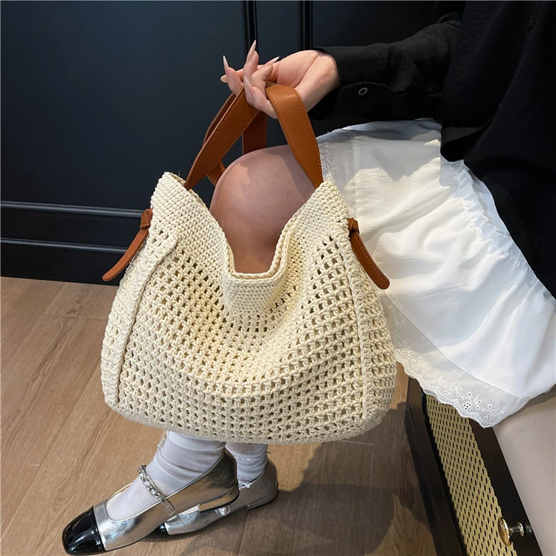2026 New Designer Hollow Out Beach Shoulder Bag Summer Handbag Bohemian Travel Shoulder Tote Lady Simple Casual knitting Bag
2026 New Designer Hollow Out Beach Shoulder Bag Summer Handbag Bohemian Travel Shoulder Tote Lady Simple Casual knitting Bag