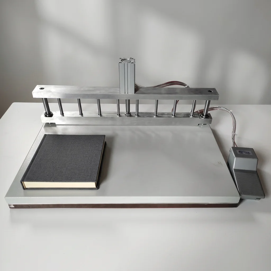 Brochure inside binding machine for pedal control pneumatic inner page making machines
Brochure inside binding machine for pedal control pneumatic inner page making machines