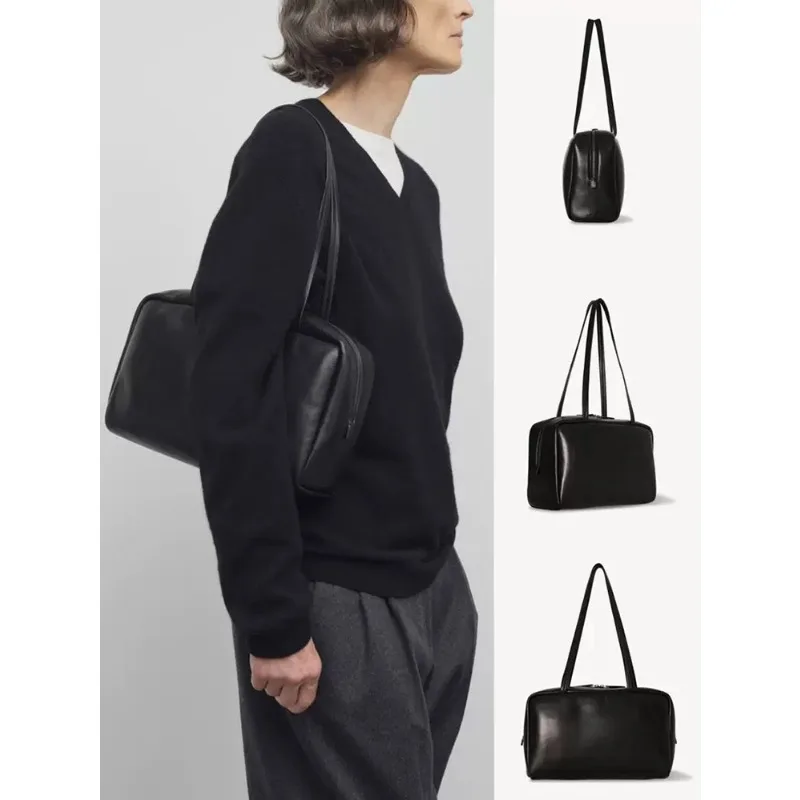 Sheepskin leather bowling bag luxury designer Boston commuter simple shoulder armpit bag women's leather material
Sheepskin leather bowling bag luxury designer Boston commuter simple shoulder armpit bag women's leather material