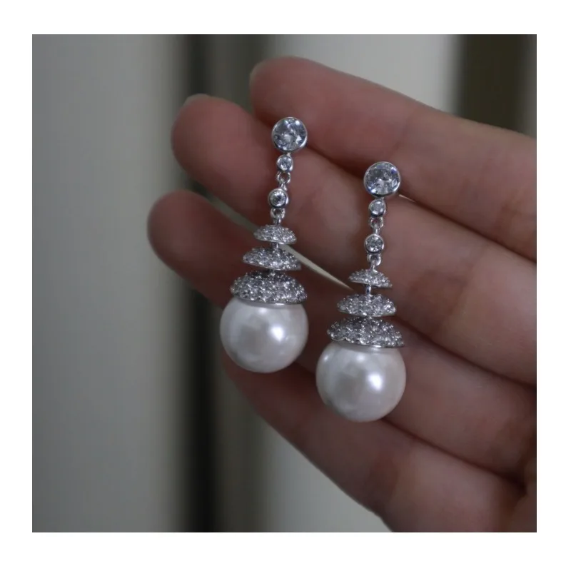 Retro Light Luxury Long Imitation Pearl Earrings Femininity Niche Design Versatile High-end Silver Bead Stud Earrings Women
Retro Light Luxury Long Imitation Pearl Earrings Femininity Niche Design Versatile High-end Silver Bead Stud Earrings Women