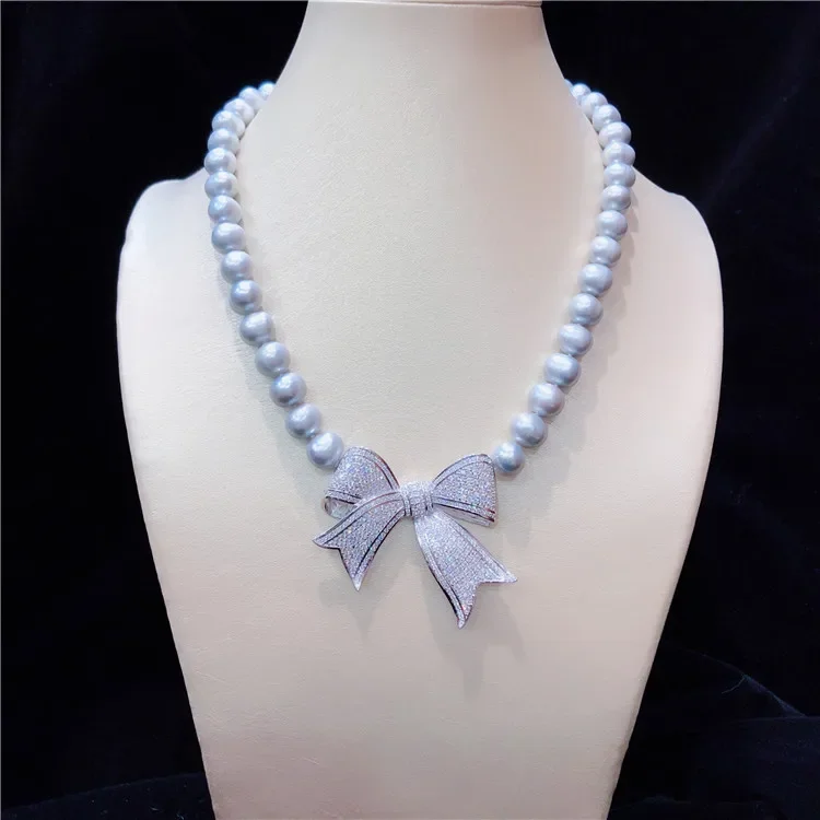 Hand knotted natural 8-9mm nearl round fresh water gray pearl temperament micro inlay zircon bowknot necklace fashion jewelry
Hand knotted natural 8-9mm nearl round fresh water gray pearl temperament micro inlay zircon bowknot necklace fashion jewelry