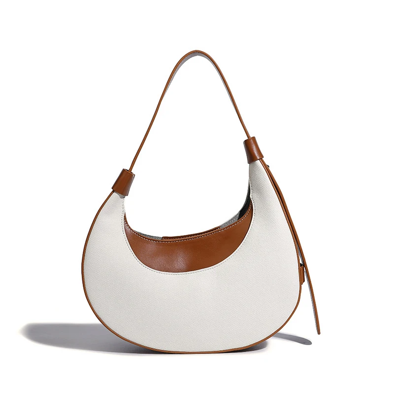 Women's Bag 2024 New Fashion Trend Versatile Color Matching Large Capacity One Shoulder Armpit Handheld Tote Bag
Women's Bag 2024 New Fashion Trend Versatile Color Matching Large Capacity One Shoulder Armpit Handheld Tote Bag
