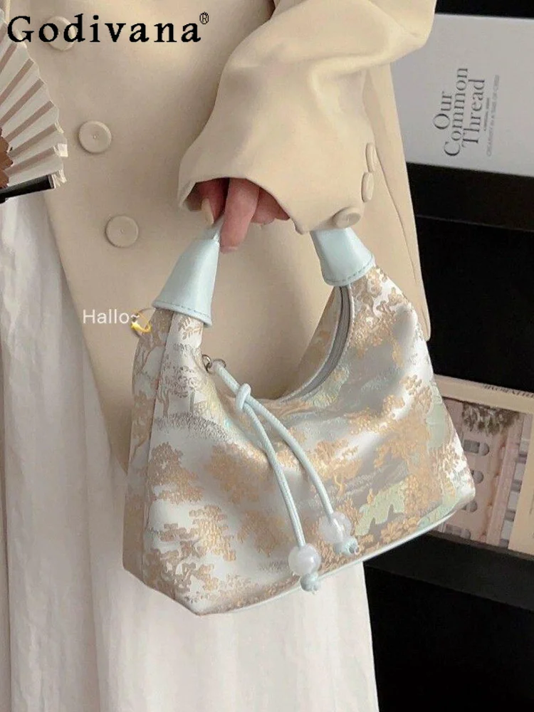 Original New Chinese Style Silk Embroidery Tote Bag Gentle Elegant Girls 2025 New Small Capacity Crossbody Shoulder Bag
Original New Chinese Style Silk Embroidery Tote Bag Gentle Elegant Girls 2025 New Small Capacity Crossbody Shoulder Bag
