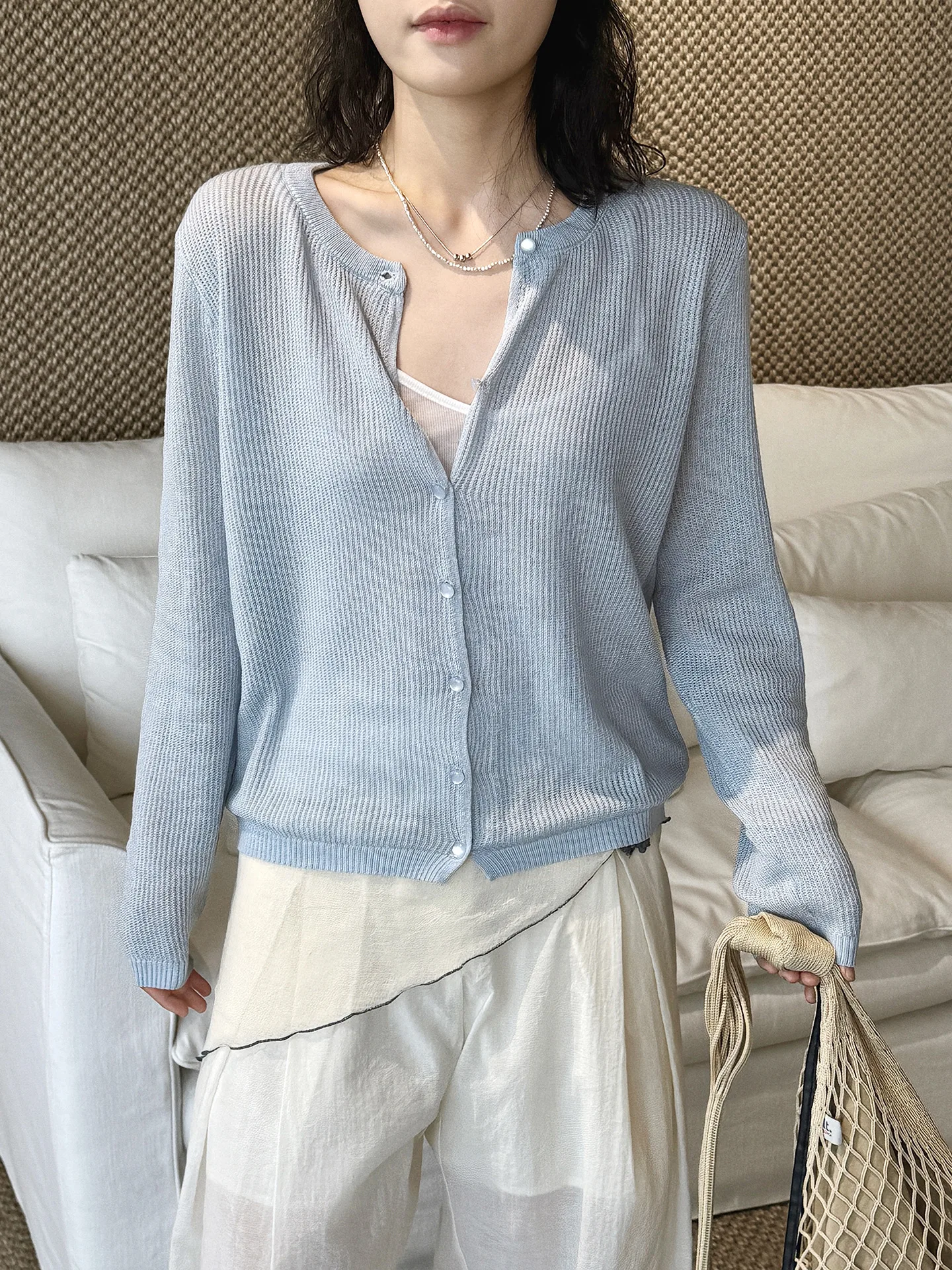 Summer new Korean lazy style round neck single breasted wool knitted sweater loose top for women
Summer new Korean lazy style round neck single breasted wool knitted sweater loose top for women