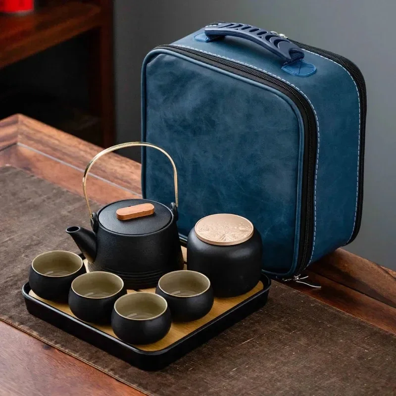 Quality Chinese Tea Set Hand-held Black Ceramic Teapot Set Kung Fu Tea Box Purple Sand Charm Tea Pet
Quality Chinese Tea Set Hand-held Black Ceramic Teapot Set Kung Fu Tea Box Purple Sand Charm Tea Pet