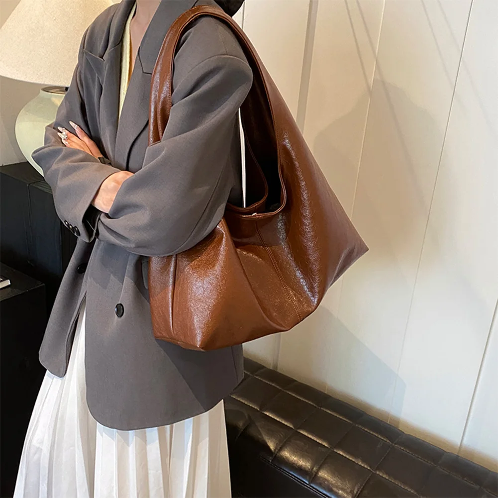 Женская простая сумка из искусственной кожи, большая вместительная повседневная сумка-тоут, однотонная простая дорожная сумка с застежкой, уличная дорожная сумка
Женская простая сумка из искусственной кожи, большая вместительная повседневная сумка-тоут, однотонная простая дорожная сумка с застежкой, уличная дорожная сумка