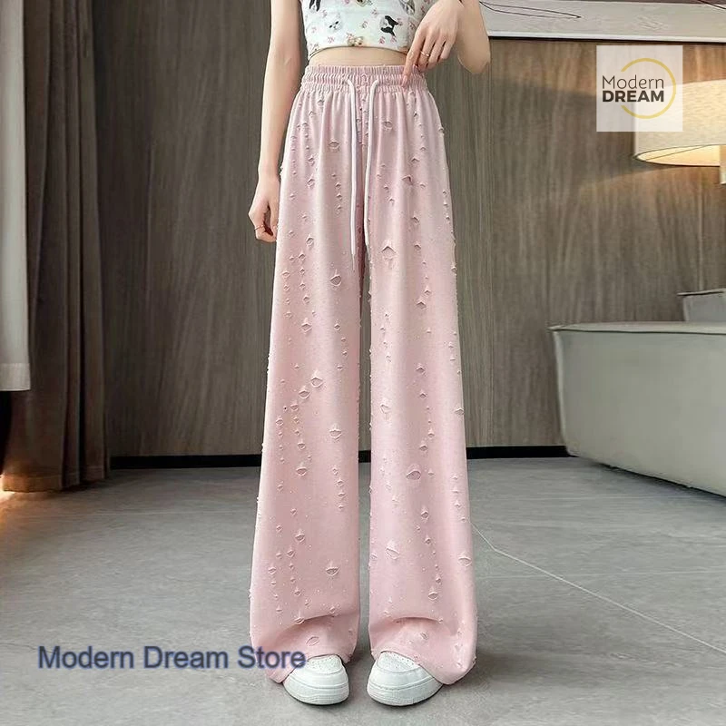 French style fashion design high waist drawstring hole wide-leg pants women's summer new casual style loose straight pants 
French style fashion design high waist drawstring hole wide-leg pants women's summer new casual style loose straight pants