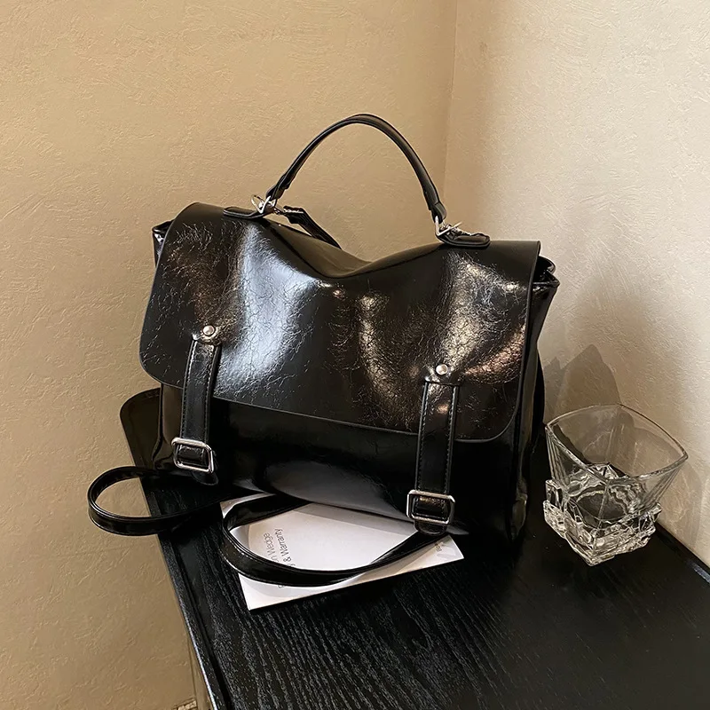 Fashionable large capacity hand-held tote bag for women in spring 2025, new high-end texture college style backpack
Fashionable large capacity hand-held tote bag for women in spring 2025, new high-end texture college style backpack