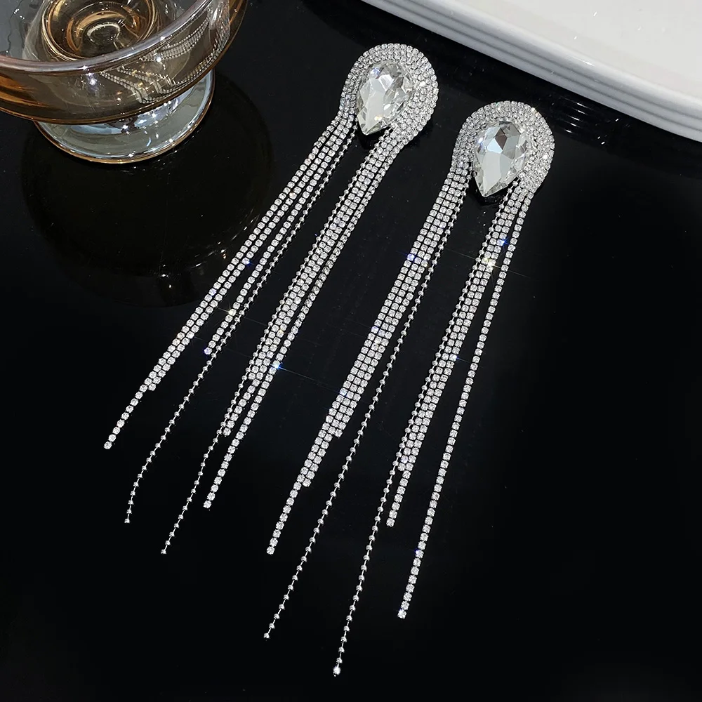 Freetry Exaggerated Full Rhinestone Big Waterdrop Long Tassel Earrings for Women Luxury Sparkling Hanging Earrings Party Jewelry
Freetry Exaggerated Full Rhinestone Big Waterdrop Long Tassel Earrings for Women Luxury Sparkling Hanging Earrings Party Jewelry