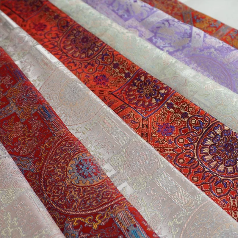 New Chinese-style ethnic costumes of imitation brocade such as robes evening gowns handcrafted boxes and woven fabrics
New Chinese-style ethnic costumes of imitation brocade such as robes evening gowns handcrafted boxes and woven fabrics