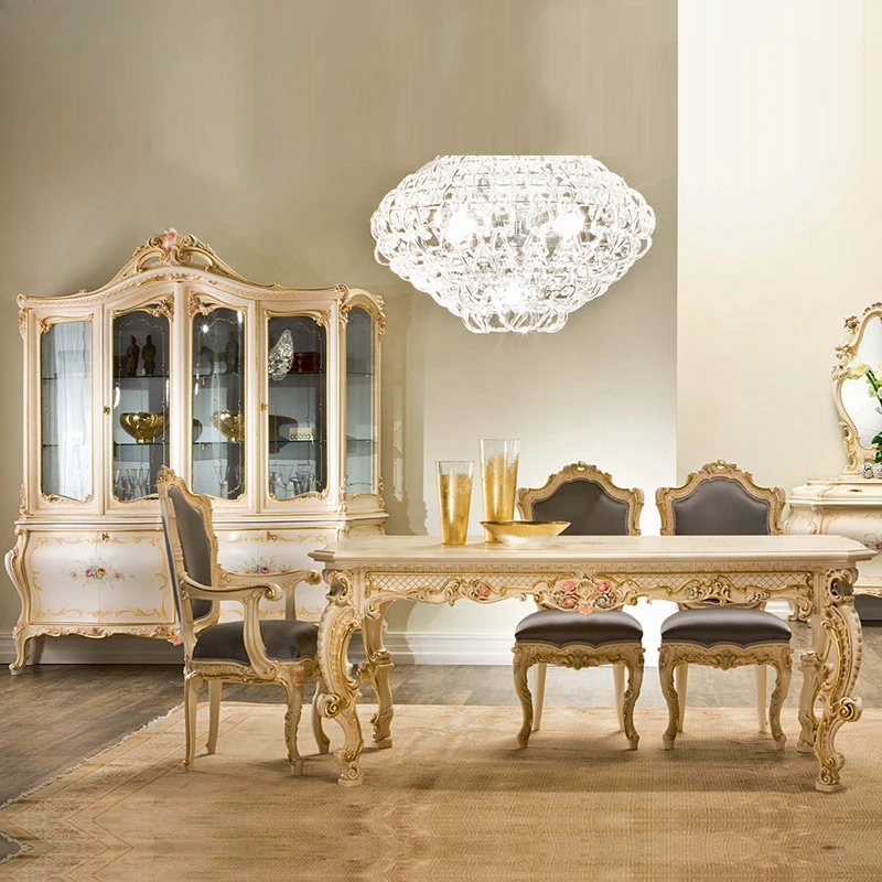 European solid wood rectangular French dining table, painted gold dining table and dining chair combination
European solid wood rectangular French dining table, painted gold dining table and dining chair combination