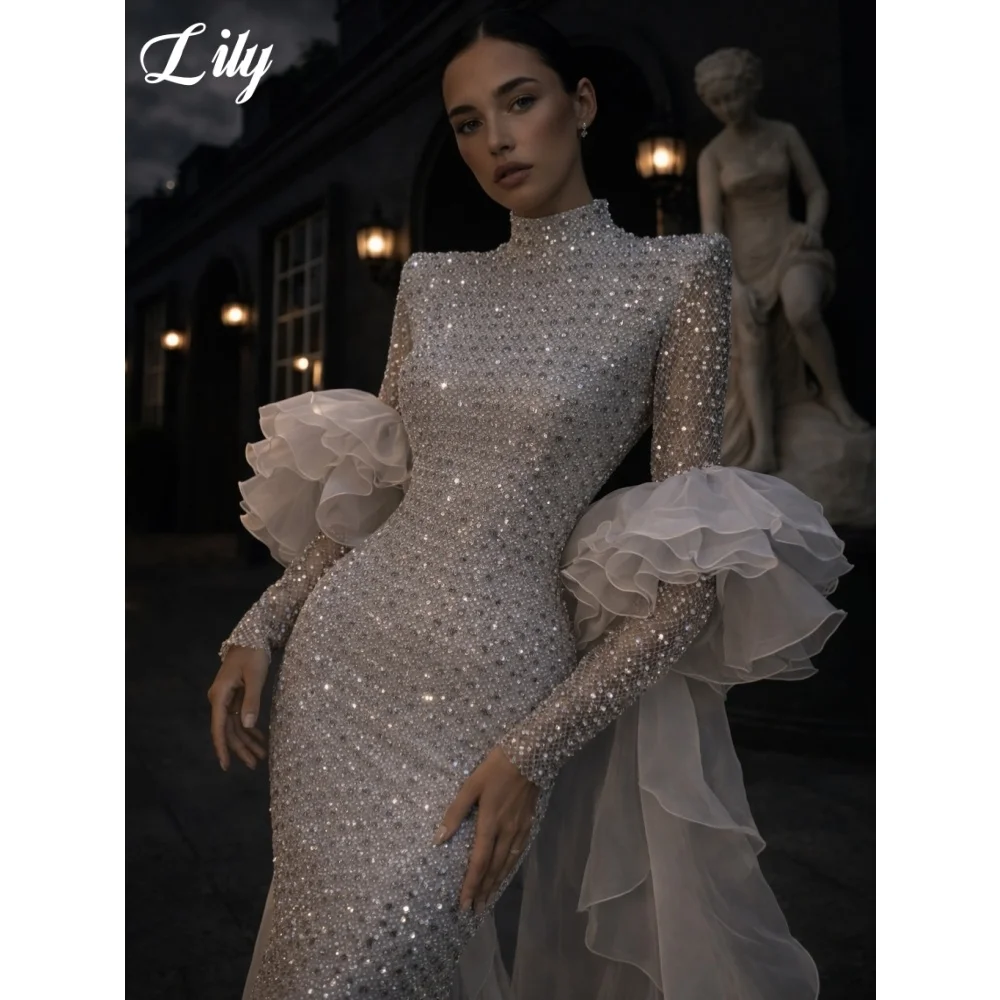 Lily Luxury Silver White High Neck Prom Dress Full Rhinestone Mesh Evening Dress With Ruffle Sleeve Formal Party Gown Customized
Lily Luxury Silver White High Neck Prom Dress Full Rhinestone Mesh Evening Dress With Ruffle Sleeve Formal Party Gown Customized