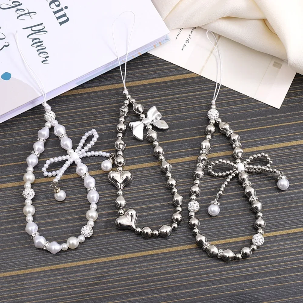 Fashion Pearl Bow Mobile Phone Lanyard Jewelry for Women Versatility Star Love Anti Lost Wrist Strap Phone Case Rope Accessories
Fashion Pearl Bow Mobile Phone Lanyard Jewelry for Women Versatility Star Love Anti Lost Wrist Strap Phone Case Rope Accessories