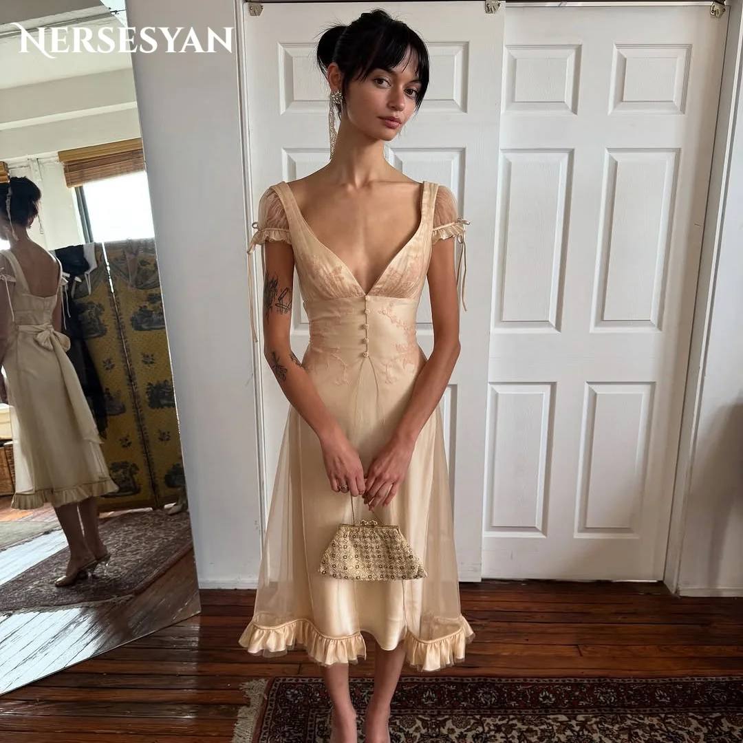 Nersesyan Champagne Lace Prom Dresses Appliques Illusion Buttons Formal Dress Cap Sleeves Women Tea Length Party Gown Customized
Nersesyan Champagne Lace Prom Dresses Appliques Illusion Buttons Formal Dress Cap Sleeves Women Tea Length Party Gown Customized