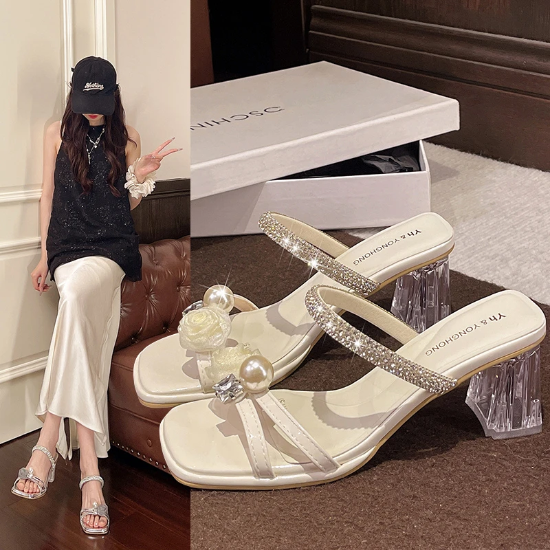 Silver Rhinestone Chunky Heel Open-Toe Slide Sandals for Women 2026 Summer New Transparent Heel Pearl Fairy Style Slippers
Silver Rhinestone Chunky Heel Open-Toe Slide Sandals for Women 2026 Summer New Transparent Heel Pearl Fairy Style Slippers