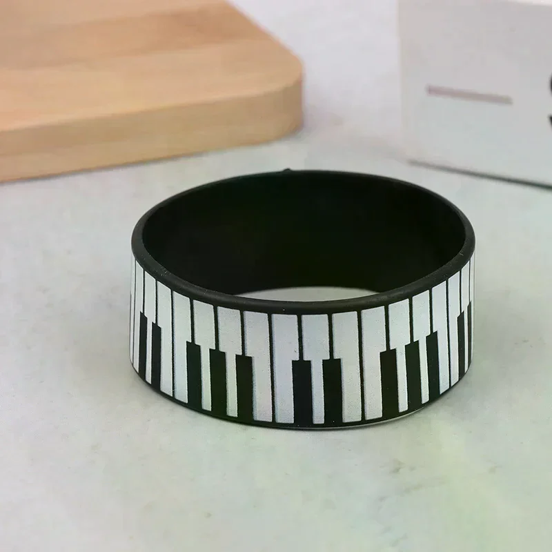 1pcs Fashion Piano Keyboard Silicone Bracelets Perfect For Music Lovers And Festivals, Suitable For All Seasons
1pcs Fashion Piano Keyboard Silicone Bracelets Perfect For Music Lovers And Festivals, Suitable For All Seasons