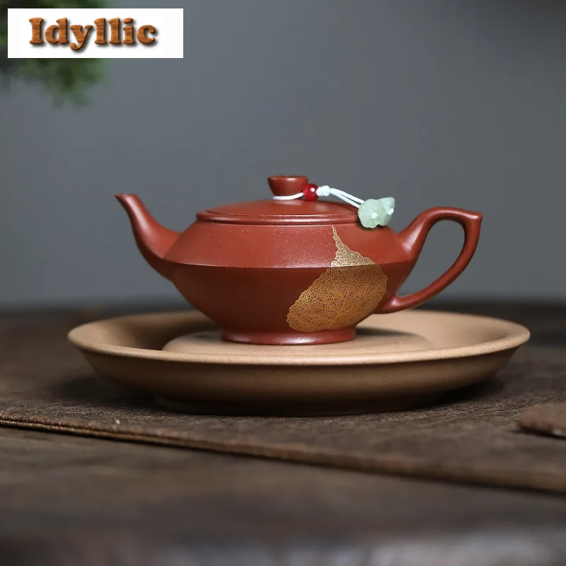 160ml Traditional Yixing Purple Clay Teapots Handmade Gold Leaf Pot Raw Ore Coarse Sand Zhu Mud Kettle Chinese Zisha Tea Set Cha
160ml Traditional Yixing Purple Clay Teapots Handmade Gold Leaf Pot Raw Ore Coarse Sand Zhu Mud Kettle Chinese Zisha Tea Set Cha