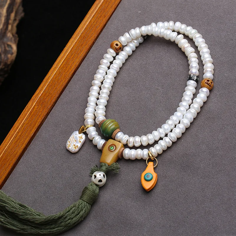 108-bead Tibetan-style antique rosary: agate, spiral beads, re-formed bone, ‘A-dai’ and ‘San-tong’ natural pearls
108-bead Tibetan-style antique rosary: agate, spiral beads, re-formed bone, ‘A-dai’ and ‘San-tong’ natural pearls