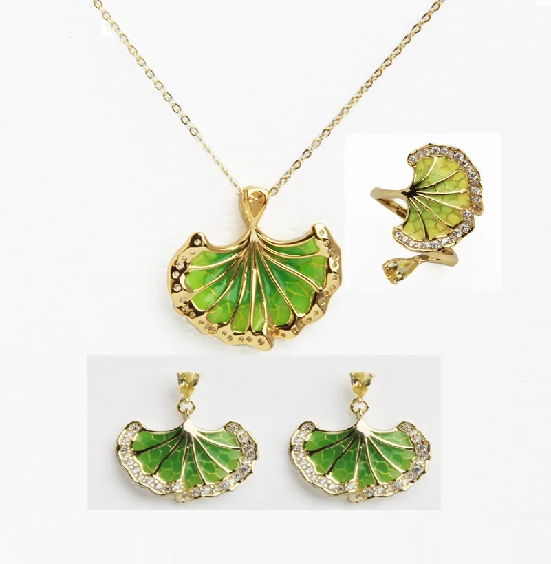 Комплект ювелирных изделий из стерлингового серебра с листьями, серьги с зелеными листьями, ожерелье, кольцо, подарок для женщин
Комплект ювелирных изделий из стерлингового серебра с листьями, серьги с зелеными листьями, ожерелье, кольцо, подарок для женщин