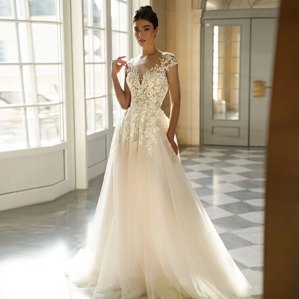 Exquisite Boho Wedding Dresses Brides Appliqued Lace Sexy Backless Cap Sleeve Tulle A Line Bridal Dress For Women Customized 
Exquisite Boho Wedding Dresses Brides Appliqued Lace Sexy Backless Cap Sleeve Tulle A Line Bridal Dress For Women Customized