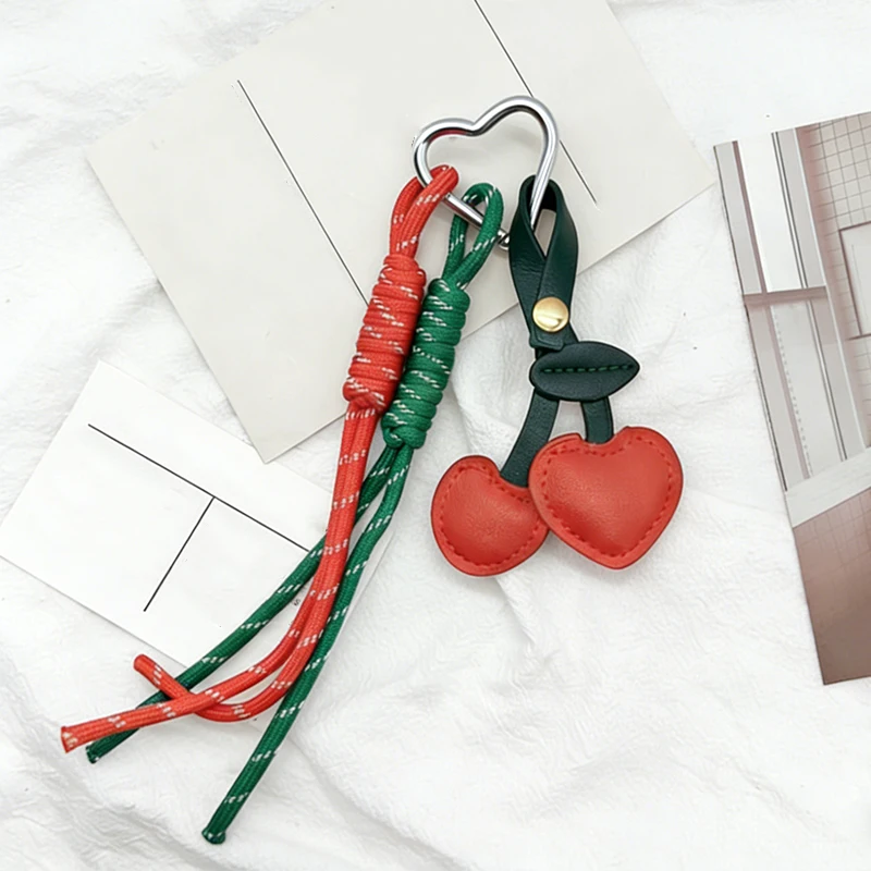 Trendy leather cord red cherry ribbon bag keychain pendant women's fashion braided rope key ring jewelry
Trendy leather cord red cherry ribbon bag keychain pendant women's fashion braided rope key ring jewelry