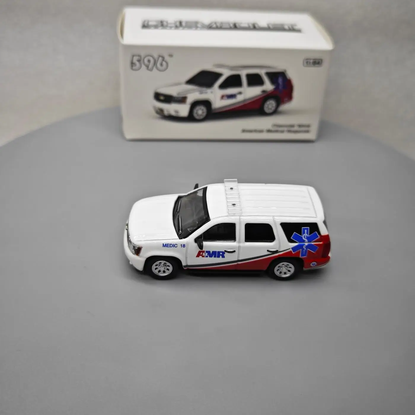 596 1:64 Chevrolet Tahoe AMR Спасательная безопасность Полицейская машина Усовершенствованная модель автомобиля Коллекционные предметы 
596 1:64 Chevrolet Tahoe AMR Спасательная безопасность Полицейская машина Усовершенствованная модель автомобиля Коллекционные предметы