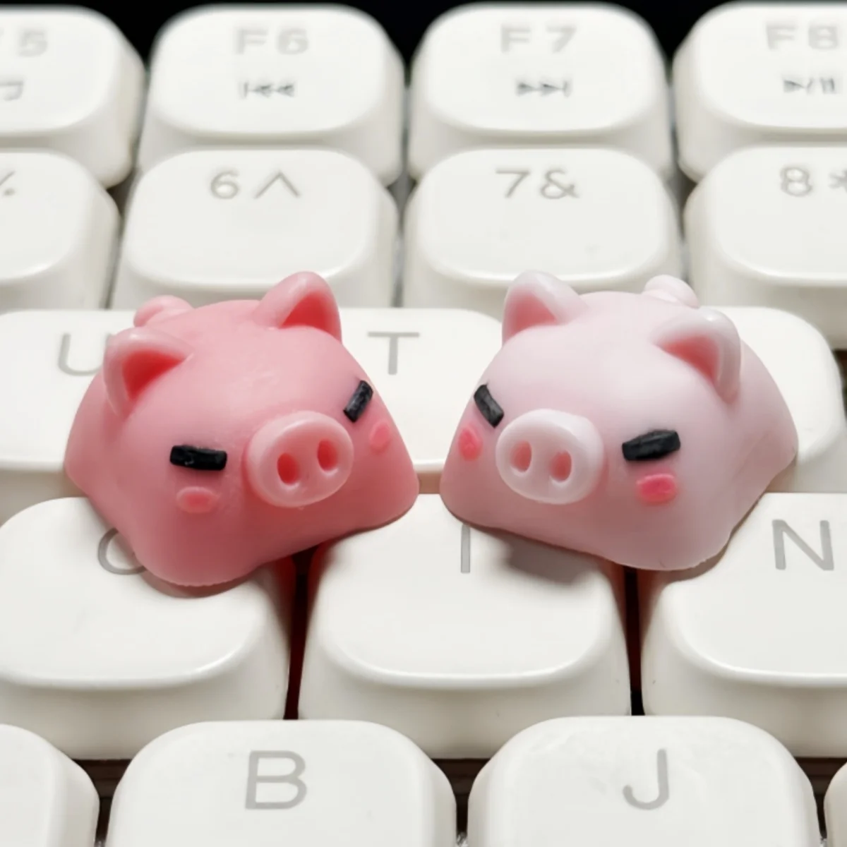 Epoxy translucent pink piggy resin keycap cross shaft mechanical keyboard keycap single
Epoxy translucent pink piggy resin keycap cross shaft mechanical keyboard keycap single