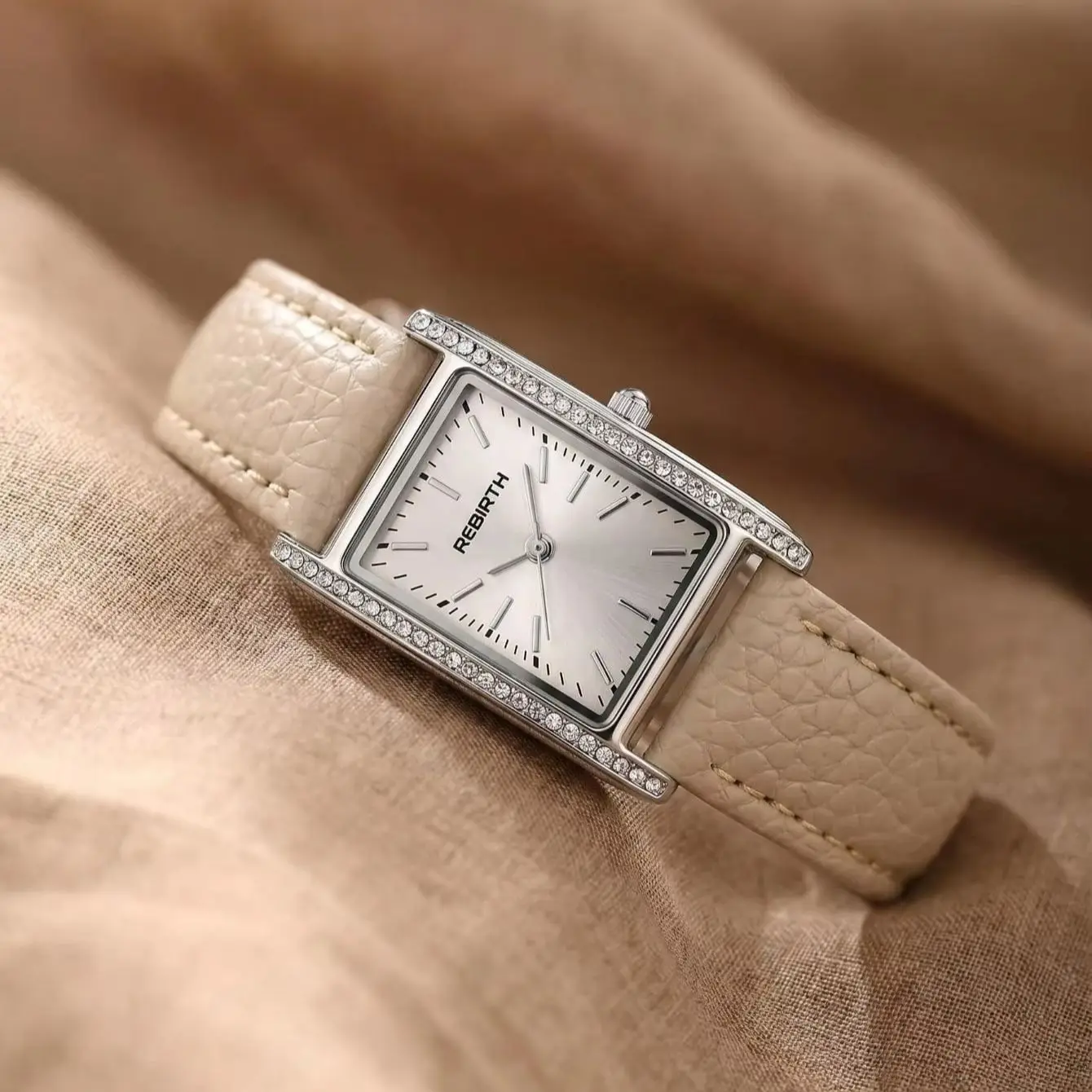 Simple and Slim Women's Quartz Watch with Small Square Dial, Diamond-Encrusted Bezel, and Thin Leather Strap for Everyday Wear
Simple and Slim Women's Quartz Watch with Small Square Dial, Diamond-Encrusted Bezel, and Thin Leather Strap for Everyday Wear